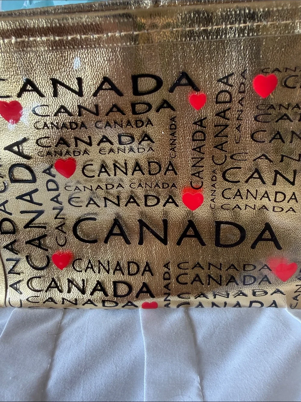 Gold Canada Print Wristlet Pouch with Red Heart Accents